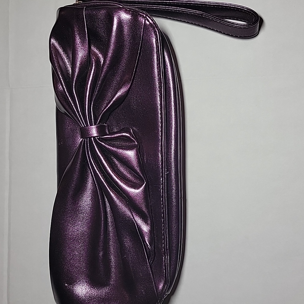 Purple bow wrist wallet